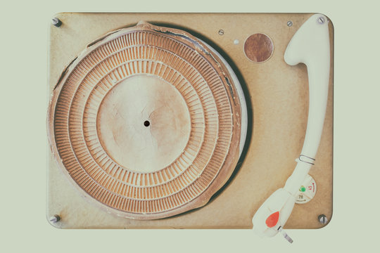 Retro styled image of an ancient weathered turntable