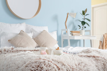 Interior of modern comfortable bedroom