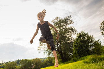 teen jumping for zest for life.