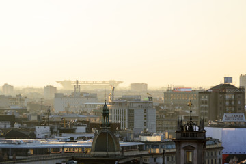 Milano, Italy, march 22, 2019: from the roof top of the Duomo church the view of the city at sunset time, in the background the San Siro stadium