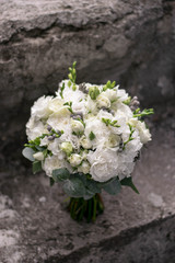 White wedding bouquet on dark background