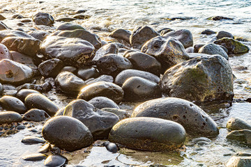 pebble stone beach in morning light