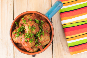 Meatballls in marinara sauce.