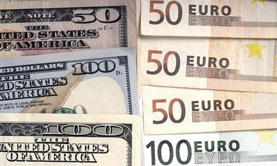 background from dollar and euro bills, top view