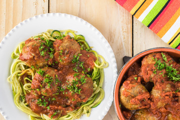 Meatballls in marinara sauce.