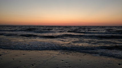 Naklejka na ściany i meble an image of sunset over baltic sea