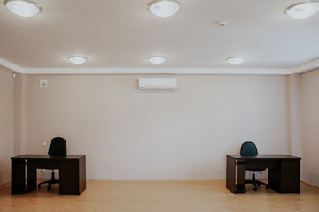 large room with desk and Chair table