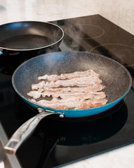 Frying pan with bacon