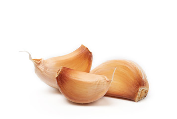 fresh raw garlic cut slice isolated on white background