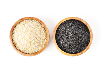Sesame seed in wooden bowl on white background