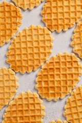 Pattern. Waffles. Viennese waffles on the light