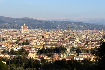 Fototapeta na wymiar Wide panoramic view of the city of Florence seen from the hills just outside the city in the Bellosguardo neighborhood