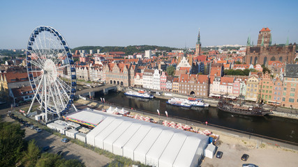 Fototapeta na wymiar Scenic embankment of the Motlawa river with historical buildings in Gdansk