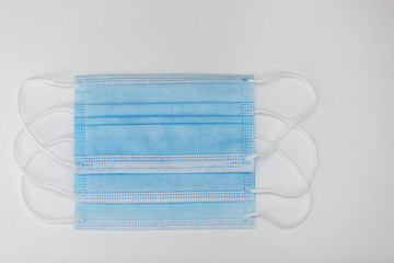 three medical protective masks on a white background