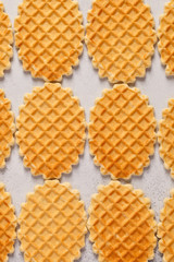 Pattern. Waffles. Viennese waffles on the light