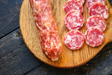 smoked sausage Fuet meat product Menu concept healthy eating. food background top view copy space...