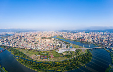 Obraz premium Taipei City Aerial View - Asia business concept image, panoramic modern cityscape building bird’s eye view under daytime and blue sky, shot in Taipei, Taiwan.