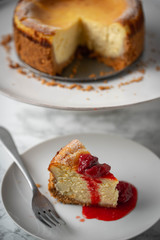 new york style cheesecake on marble background