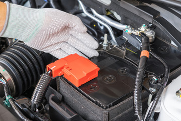 Fototapeta na wymiar Technician check battery car terminal