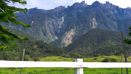 Fototapeta na wymiar mountain landscape with a wooden fence