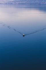 Aerial view of small fishing boat in Greece