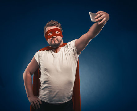 Narcissistic Superhero Man Takes Selfie By Mobile Phones