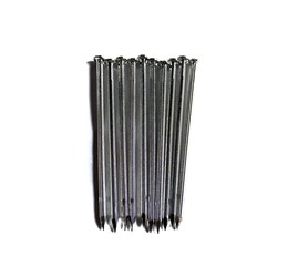 Steel nails on white background. construction concept