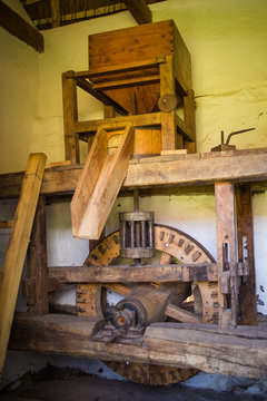 Close up image of an antique stone mill