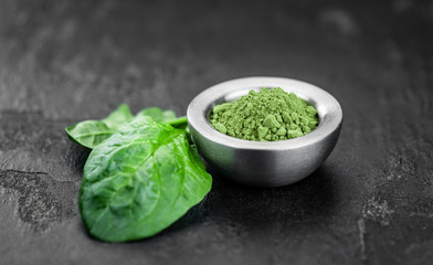 Freshly made spinach powder (close up; selective focus)