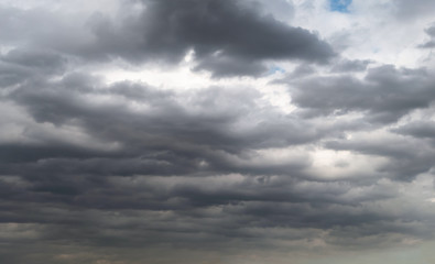 Obraz premium Dark storm clouds before rain used for climate background. Clouds become dark gray before raining.