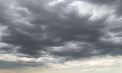 Fototapeta na wymiar Dark storm clouds before rain used for climate background. Clouds become dark gray before raining.