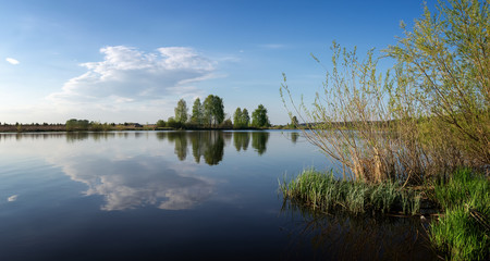 may landscape on the river Bank with trees, Russia, Ural