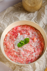 A bowl of sweet red sago in coconut cream.Asian desserts concept