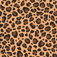Leopard hand-drawn seamless pattern. Animal print background