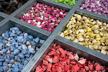 Stone path background above. A lot of stones. The stones are small and large. Different sizes and colors of stones. Gravel.