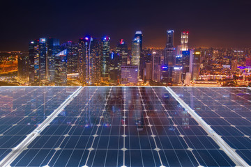 Solar panel over cityscapes, solar power green energy for life concept,City Singapore Skyline.