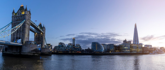 Fototapeta na wymiar London cityscape panorama with River Thames Tower Bridge and London's City Hall at dawn
