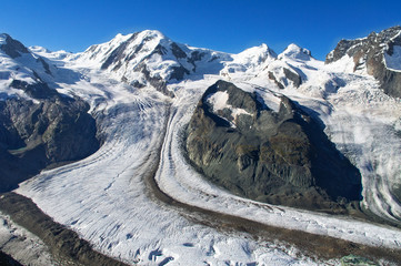 Glacier in Swiss Alps, snow and ice, beautiful alpine landscape of summer in mountains, Zermatt, Switzerland
