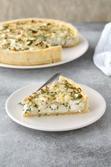 Pieces of quiche lorraine with bacon and cheese. French cuisine.