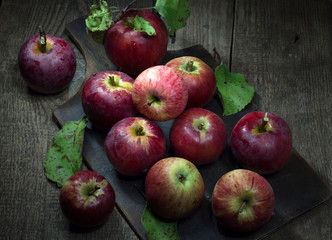 red apples on wooden table