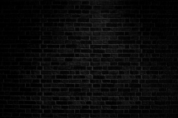 Old black brick wall texture background.
