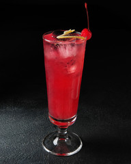 Cocktail close-up on a black background