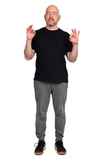 man with sportswear meditation on white background