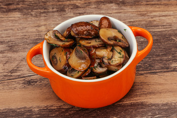 Roasted champignon with herbs and spices