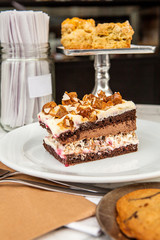 Dessert portion based on chocolate cream and caramel in gourmet bakery.