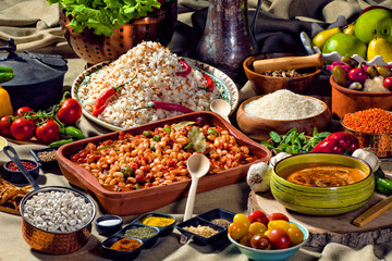 cooked and uncooked haricot beans, served with traditional cooked rice and Traditional red lentil...