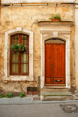 Fototapeta na wymiar Door and window house in provincial European town