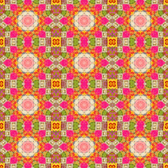 Colourful flowers have been edited to  have  a kaleidoscope wallpaper background look.