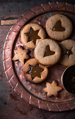 Homemade Christmas New year star shape  caramel cookies  over wooden  background. Flat lay, space.