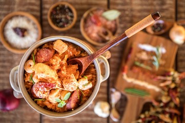 Traditional jambalaya serwed on plate. Top view. Chicken and rice dish with sausage and shrimp. Spice food.